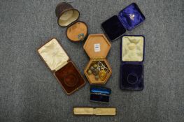 A small group of jewellery etc. and empty jewellery boxes.