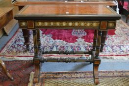 A good Victorian ebonised and amboyna inlaid rectangular foldover card table, the frieze decorated