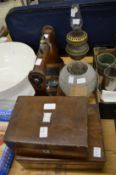 Two sewing boxes, a tantalus frame and an oil lamp.