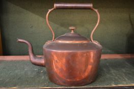 A copper kettle.