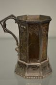 A Gothic revival silver tankard with engraved decoration.