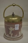 A Jasper ware biscuit or tobacco jar and cover.