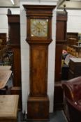 A 19th century walnut long case clock with eight-day movement, the square brass dial with silvered