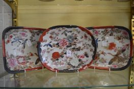 Three Japanese dishes painted with birds.