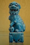 A turquoise glazed Chinese lion dog.