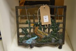 A cast iron book stand.