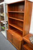 A Chinese redwood cupboard bookcase.