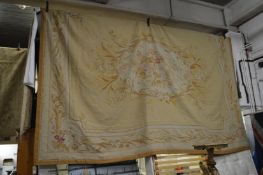 A large Aubusson style floral decorated tapestry wall hanging, 360cms x 260cms.