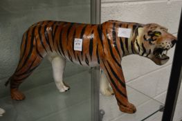 A papier mache model of a tiger.