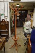 A bentwood hat and coat stand.