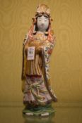 A Japanese Kutani figure of a woman.
