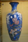 A large cloisonne vase.