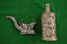 A silver mounted scent bottle and a salt.