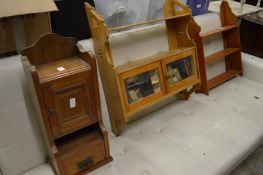 Three wall shelves / cabinets.