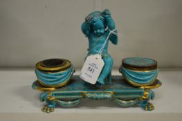 A continental turquoise glazed figural ink stand.