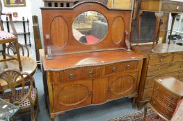 A mahogany mirror back sideboard.