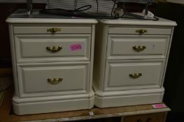 A pair of bedside chests.