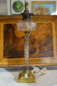 A good cut glass and brass Corinthian column style oil lamp converted to electricity.