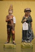 A pair of pottery figures (AF).