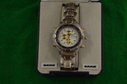 A boxed gent's wristwatch.