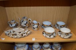 A Japanese eggshell part tea service.