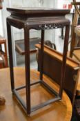 A Chinese hardwood square shaped stand.