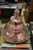 The copper top section of a Victorian street lantern.