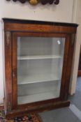 A Victorian walnut pier cabinet.