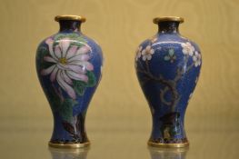 A pair of small cloisonne vases.