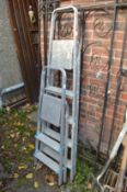 Two aluminium step ladders.