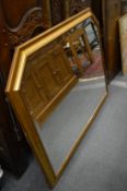 A large modern gilt framed overmantle mirror.