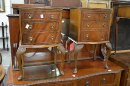 A pair of mahogany bow front three-drawer chests.