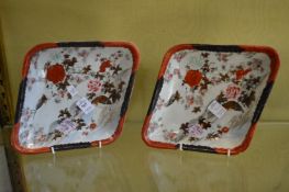 A pair of Japanese lozenge shaped dishes painted with birds.