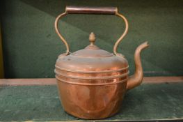 A copper kettle.