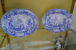 A pair of blue and white decorated oval dishes.