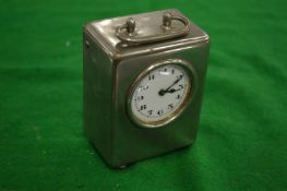 A miniature carriage clock.