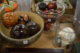 Glass bowls containing wax fruit and other decorative items to include shells.