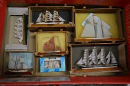 Model sailing ships.