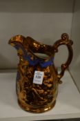A lustre ware jug.