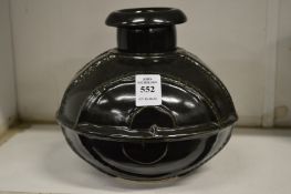 An unusual oriental squat vase.