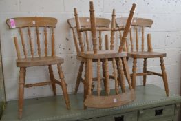 A set of four pine kitchen chairs (some in need of repair).