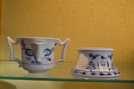 A Meissen porcelain stand and similar jug.