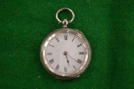 A silver pocket watch.