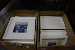 A set of fourteen small square framed colour prints.