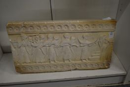 An Egyptian style plaster relief.
