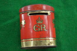 An Oxo cube money box.