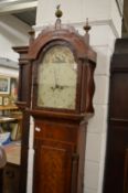 A 19th century mahogany long case clock with painted arch dial.