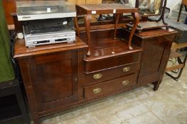 A mahogany sideboard.