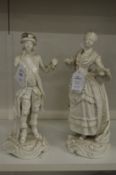 Two white porcelain figures of a gallant and young lady (AF).