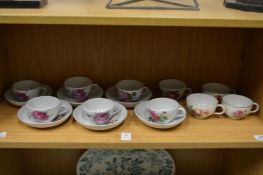 Continental floral decorated cups and saucers.